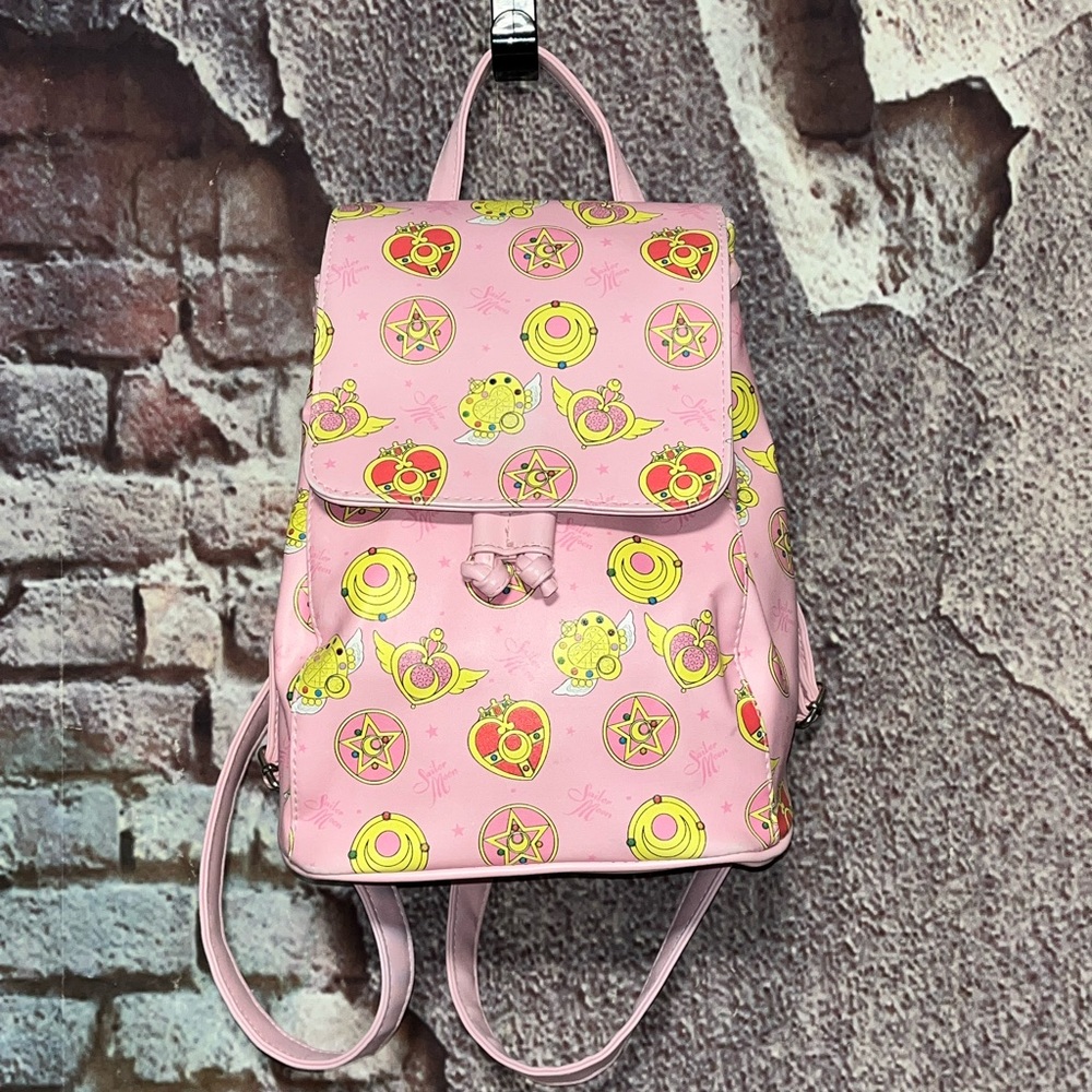 Sailor Moon Transformation Brooch Pink Drawstring Mini Backpack by GEE